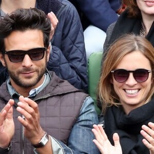 Maxim Nucci (Yodelice) et Isabelle Ithurburu en couple et très amoureux dans les tribunes des Internationaux de France de tennis de Roland-Garros à Paris le 24 mai 2016 © Dominique Jacovides / Bestimage