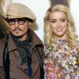 Johnny Depp et Amber Heard au photocall du film "Rhum Express" le 8 novembre 2011 à Paris