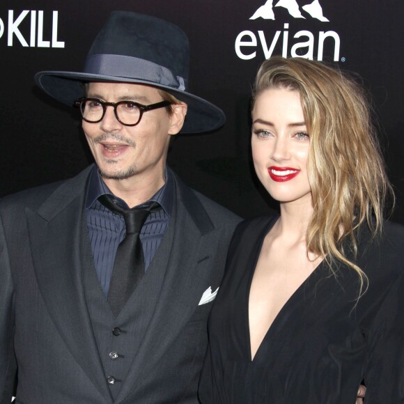 Johnny Depp et sa fiancée Amber Heard - Première du film "3 Days to Kill" à Hollywood, le 12 février 2014.