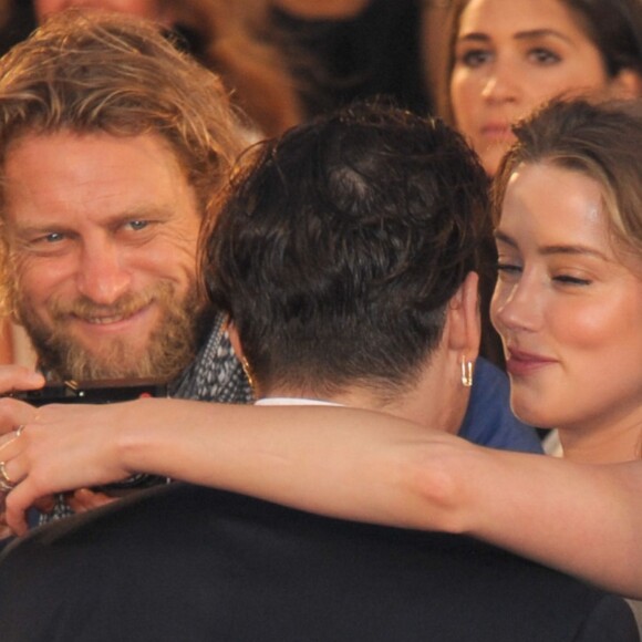 Johnny Depp et sa femme Amber Heard - Tapis rouge du film Black Mass (Strictly Criminal) lors du 72ème festival du film de Venise (la Mostra), le 4 septembre 2015.