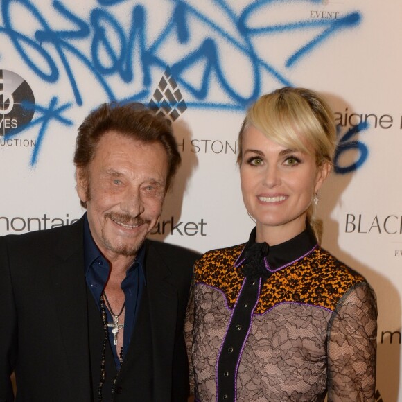 No Tabloids - Exclusif - Johnny Hallyday et sa femme Laeticia Hallyday - Le joaillier Aaron Jah Stone et l'artiste Kongo ont présenté une nouvelle collection qui allie Street Art et Joaillerie chez Montaigne Market à Paris le 4 mars 2016.