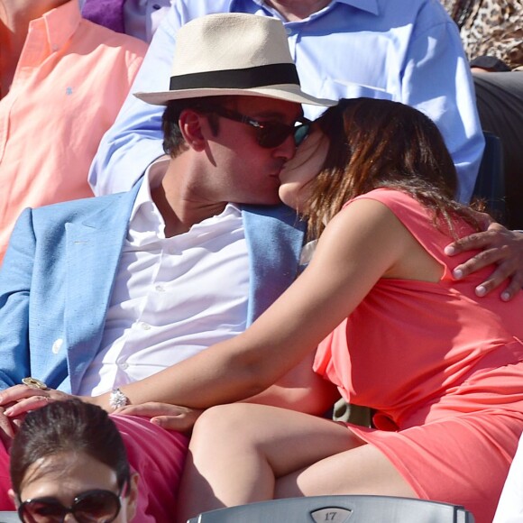 Marion Bartoli et son compagnon dans les tribunes lors de la finale des Internationaux de tennis de Roland-Garros à Paris, le 7 juin 2015.