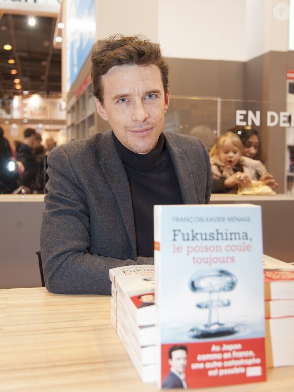 François-Xavier Ménage pour "Fukushima, le poison coule toujours" - Le "33ème Salon du Livre" au parc des expositions de la porte de Versailles à Paris, le 20 mars 2016. © Perusseau/Bestimage