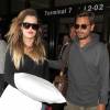 Scott Disick et Khloe Kardashian arrivent à l'aéroport LAX de Los Angeles. Le 17 août 2014