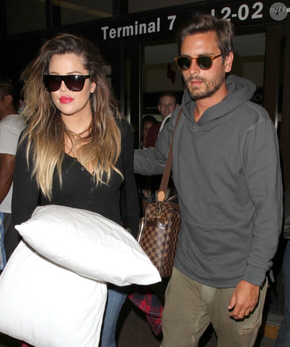 Scott Disick et Khloe Kardashian à l'aéroport LAX de Los Angeles. Le 17 août 2014