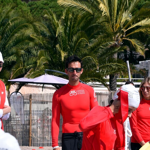 Exclusif - La princesse Charlene de Monaco, ici avec Pierre Frolla, et sa Fondation organisaient le 6 juin 2016 sur la plage du Larvotto une nouvelle journée d'action du programme Water Safety pour la prévention de la noyade, avec l'aide de grands champions comme Alain Bernard et Pierre Frolla. © Bruno Bebert / Pool restreint Monaco / Bestimage - Crystal - Visual