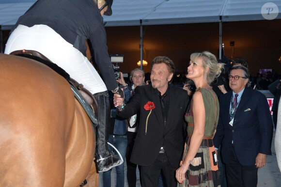 Johnny Hallyday et sa femme Laeticia Hallyday - Remise du Prix Eiffel avec Johnny et Laeticia Hallyday - Record du saut en hauteur de la ville de Paris / EOS - Longines Paris Eiffel Jumping à la plaine de Jeux de Bagatelle à Paris le 1er juillet 2016. Cette remise de prix est le prologue de la soirée au profit de l'association "La bonne étoile" de Laeticia Hallyday. © Olivier Borde / Veeren / Bestimage
