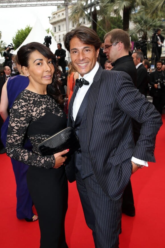 Giuseppe Polimeno et sa compagne Hinda arrivent au Palais des Festivals pour le film Jimmy's Hall lors du 67e Festival de Cannes, le 22 mai 2014