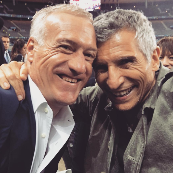 Nagui avec son ami Didier Deschamps au Stade de France lors de la victoire des Bleus contre l'Islande à l'Euro 2016.