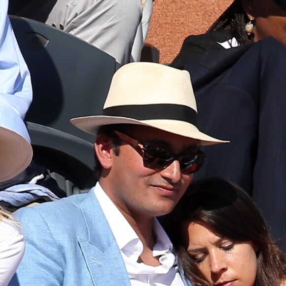 Marion Bartoli et son compagnon dans les tribunes lors de la finale des Internationaux de tennis de Roland-Garros à Paris, le 7 juin 2015.