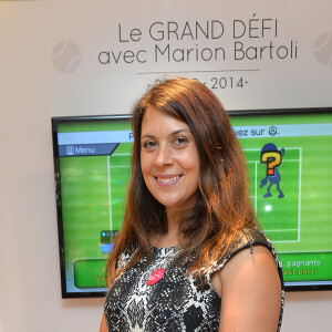 Exclusif - Marion Bartoli défie ses fans à la Wii pour l'association ELA à la boutique Maty, place de l'Opéra à Paris, le 20 septembre 2014.