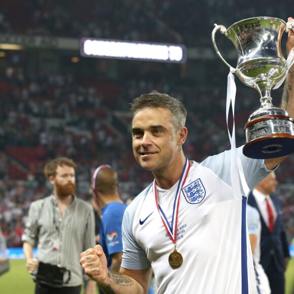 Robbie Williams - Match de football caritatif au stade Old Trafford à Manchester, le 5 juin 2016.