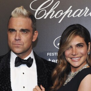 Robbie Williams et sa femme Ayda Field à la Soirée Chopard Gold Party à Cannes lors du 68ème festival international du film.