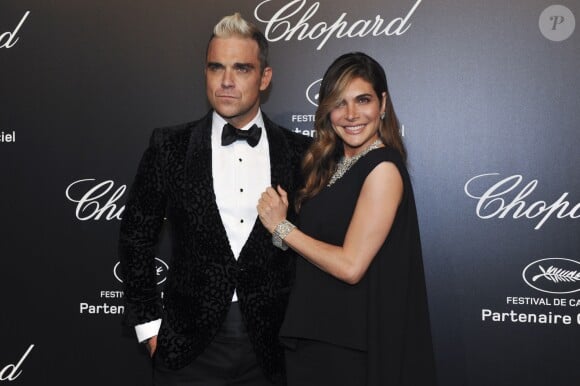 Robbie Williams et sa femme Ayda Field à la Soirée Chopard Gold Party à Cannes lors du 68ème festival international du film.
