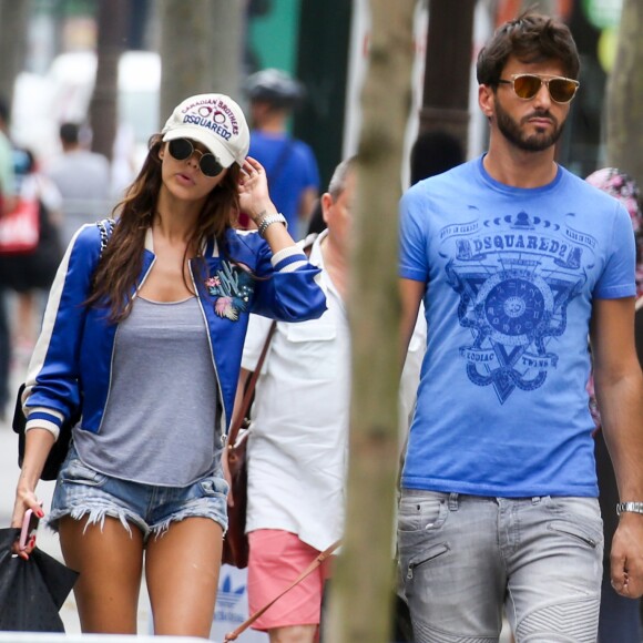 Exclusif - Nabilla Benattia et son compagnon Thomas Vergara déjeunent chez "Pizza Pino" sur les Champs Elysées et vont faire du shopping sur l'Avenue Montaigne avec leur chien Pita à Paris, France, le 21 juillet 2016. © Agence/Bestimage