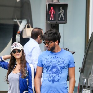 Exclusif - Nabilla Benattia et son compagnon Thomas Vergara déjeunent chez "Pizza Pino" sur les Champs Elysées et vont faire du shopping sur l'Avenue Montaigne avec leur chien Pita à Paris, France, le 21 juillet 2016. © Agence/Bestimage