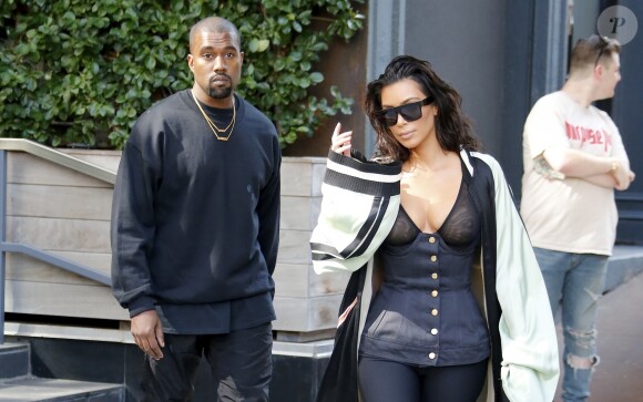 Kim Kardashian et son mari Kanye West sortent d'un rendez-vous à Tribeca, New York le 30 août 2016.