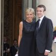 Emmanuel Macron et sa femme Brigitte Trogneux - Dîner d'Etat en l'honneur du Felipe VI et la reine Letizia d'Espagne, reçus par François Hollande, président de la République française, au Palais de l'Elysée à Paris le 2 juin 2015.