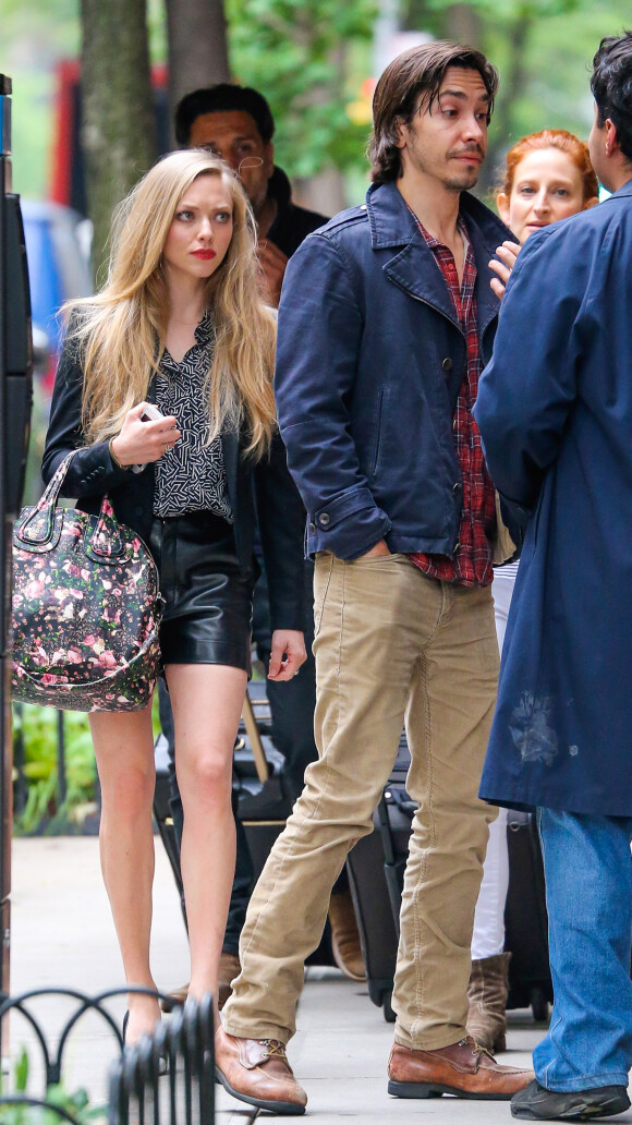 Amanda Seyfried et son petit ami Justin Long sortent de chez eux à New York, le 22 mai 2014.