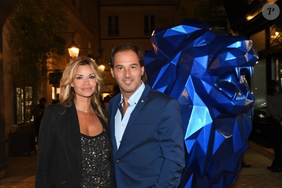 Exclusif - Première sortie de Ingrid Chauvin et son mari Thierry Peythieu depuis la naissance de leur fils Tom à l'iinauguration du Village Royal By Richard Orlinski à Paris le 15 septembre 2016. © Bellak-Moreau/Bestimage