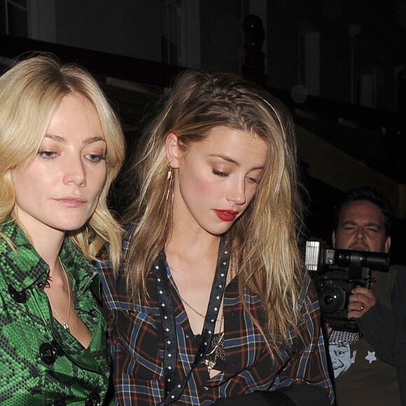 Clara Paget, Amber Heard et un ami arrivent à la soirée LOVE Magazine au club Loulou's à Londres, Royaume Uni, le 19 septembre 2016.