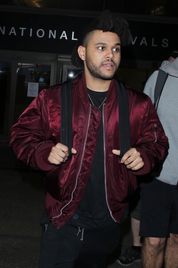 Le chanteur canadien The Weeknd (Abel Makkonen Tesfaye) à l'aéroport Lax de Los Angeles le 8 Avril 2016.