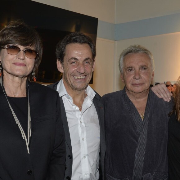 Anne-Marie Périer, Nicolas Sarkozy, Michel Sardou et Carla Bruni-Sarkozy - Loge de l'Olympia à l'issue du concert de Michel Sardou à Paris le 7 juin 2013.