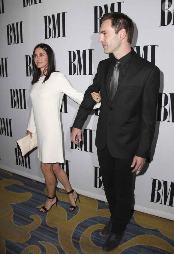 Courteney Cox et son fiancé Johnny McDaid lors des la 64 ème soirée annuelle des BMI Pop Awards au Beverly Wilshire Four Seasons Hotel à Los Angeles, le 10 mai 2016.