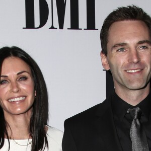 Courteney Cox et son fiancé Johnny McDaid lors des la 64 ème soirée annuelle des BMI Pop Awards au Beverly Wilshire Four Seasons Hotel à Los Angeles, le 10 mai 2016
