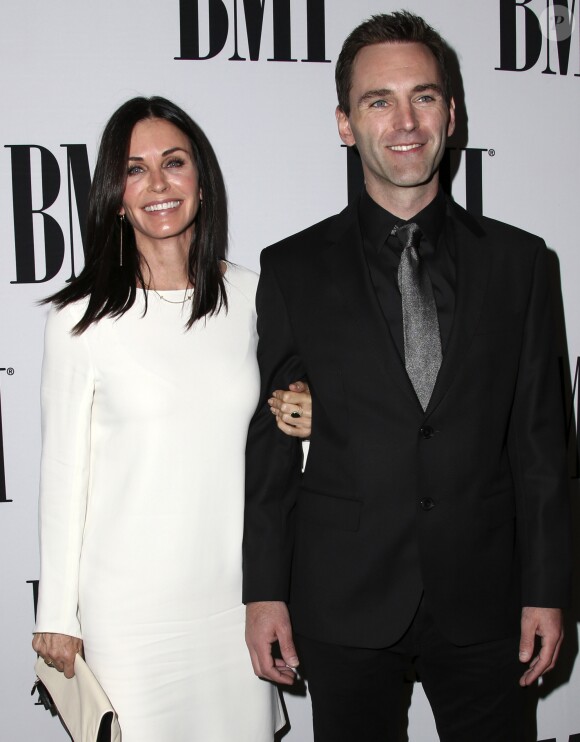 Courteney Cox et son fiancé Johnny McDaid lors des la 64 ème soirée annuelle des BMI Pop Awards au Beverly Wilshire Four Seasons Hotel à Los Angeles, le 10 mai 2016