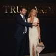 Michelle Hunziker et son mari Tomaso Trussardi assistent au défilé de mode Trussardi lors de la Fashion Week à Milan, le 25 septembre 2016.