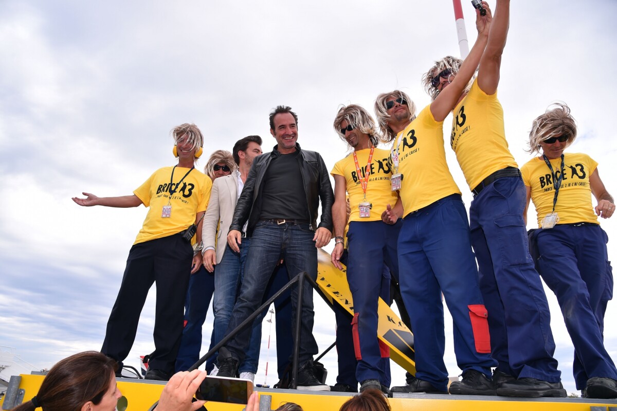 Photo : Jean Dujardin et Clovis Cornillac lors de l'arrivée surprise