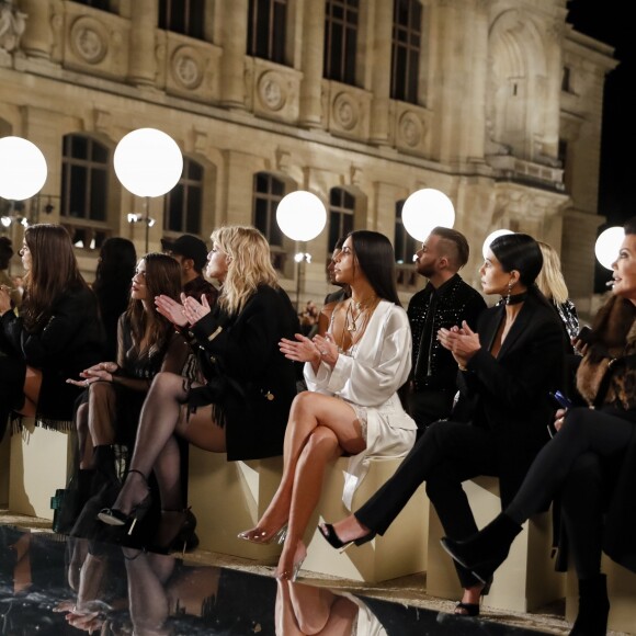 Kim Kardashian, Kourtney Kardashian, leur mère Kris Jenner et son compagnon Corey Gamble - Défilé Givenchy par Riccardo Tisci (collection prêt-à-porter printemps-été 2017) à Paris, le 2 octobre 2016. © Olivier Borde/Bestimage