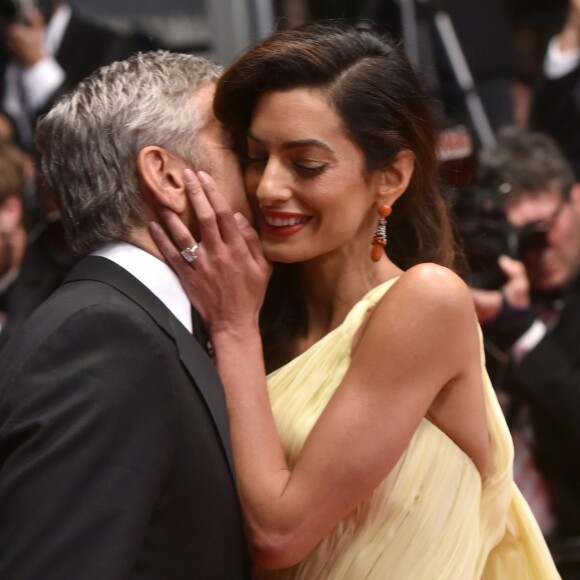 George Clooney et sa femme Amal Alamuddin Clooney lors du 69ème Festival International du Film de Cannes. Le 12 mai 2016.
