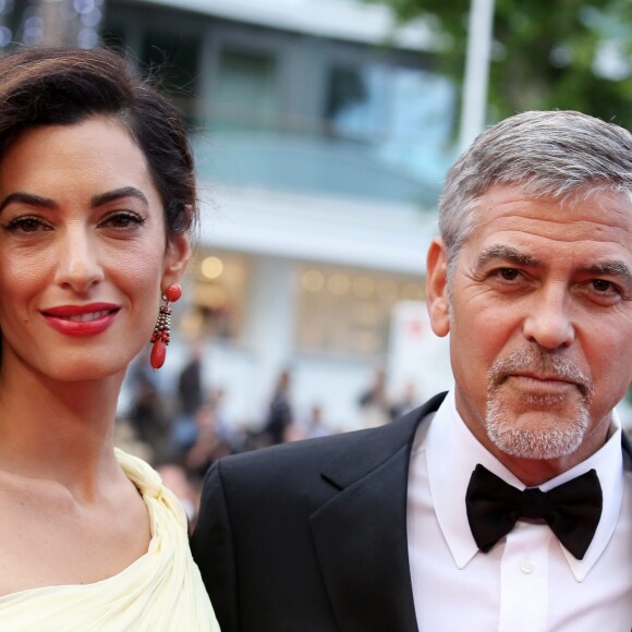George Clooney et sa femme Amal Alamuddin Clooney lors du 69ème Festival International du Film de Cannes. Le 12 mai 2016.