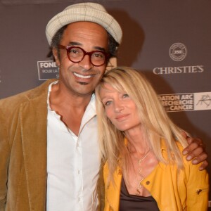 Yannick Noah et sa femme Isabelle Camus lors du dîner de la fondation ARC au restaurant de l'hôtel The Peninsula à Paris le 10 octobre 2016.