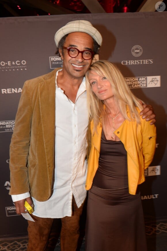 Yannick Noah et sa femme Isabelle Camus lors du dîner de la fondation ARC au restaurant de l'hôtel The Peninsula à Paris le 10 octobre 2016.