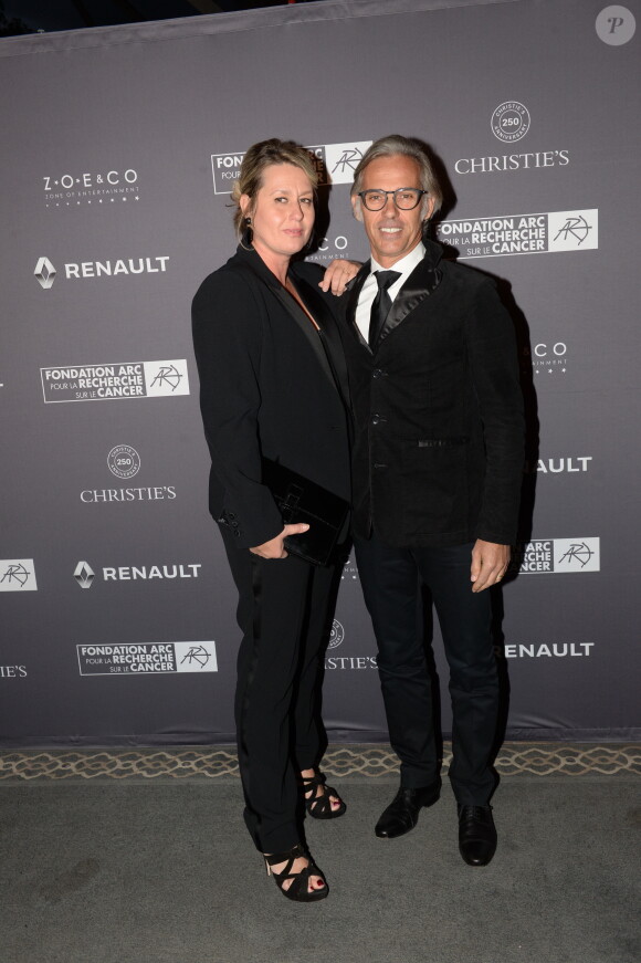 Paul Belmondo et sa femme Luana lors du dîner de la fondation ARC au restaurant de l'hôtel The Peninsula à Paris le 10 octobre 2016.