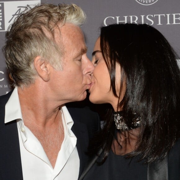 Franck Dubosc et sa femme Danièle lors du dîner de la fondation ARC au restaurant de l'hôtel The Peninsula à Paris le 10 octobre 2016.