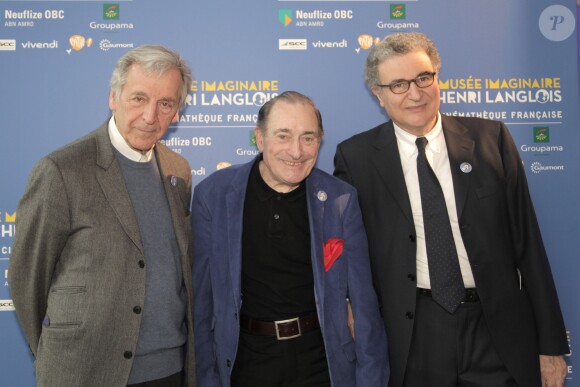 Constantin Costa Gavras, Pierre Etaix et Serge Toubiana - Vernissage de l'exposition "Le musée imaginaire d'Henri Langlois" à la Cinémathèque de Paris. Le 7 avril 2014.