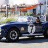 Exclusif - Johnny Hallyday et un ami se baladent à Los Angeles avec sa nouvelle voiture, une AC Cobra le 8 octobre 2016.