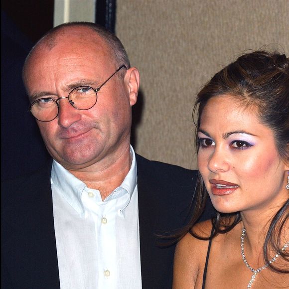 Phil Collins posant avec sa femme Orianne lors de la cérémonie des Songwriters Hall of Fame le 13 juin 2003