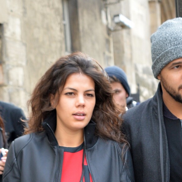 Jo-Wilfried Tsonga et sa compagne Noura El Swekh au défilé Y-3 au Couvent des Cordeliers à Paris, le 25 janvier 2015. Le couple attend son premier enfant pour 2017.