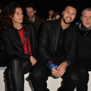 Jo-Wilfried Tsonga et sa compagne Noura El Swekh au défilé Y-3 au Couvent des Cordeliers à Paris, le 25 janvier 2015. Le couple attend son premier enfant pour 2017.