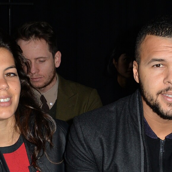 Jo-Wilfried Tsonga et sa compagne Noura El Swekh au défilé Y-3 au Couvent des Cordeliers à Paris, le 25 janvier 2015. Le couple attend son premier enfant pour 2017.