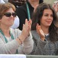 Evelyne Tsonga et Noura El Swekh lors du match entre Jo-Wilfried Tsonga et Jerzy Janowicz aux Internationaux de France de tennis de Roland-Garros à Paris, le 30 mai 2014.