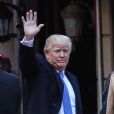 Le candidat du parti Républicain Donald Trump et sa femme Melania Trump vont voter pour les élections présidentielles américaines dans une école publique 59 du quartier de Manhattan à New York, le 8 novembre 2016.