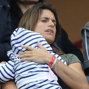 Amélie Mauresmo et son fils Aaron lors du match du quart de finale de l'UEFA Euro 2016 France-Islande au Stade de France à Saint-Denis, France le 3 juillet 2016. © Cyril Moreau/Bestimage