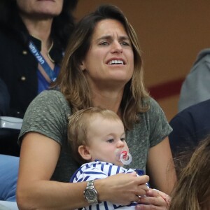 Amélie Mauresmo et son fils Aaron lors du match du quart de finale de l'UEFA Euro 2016 France-Islande au Stade de France à Saint-Denis, France le 3 juillet 2016. © Cyril Moreau/Bestimage