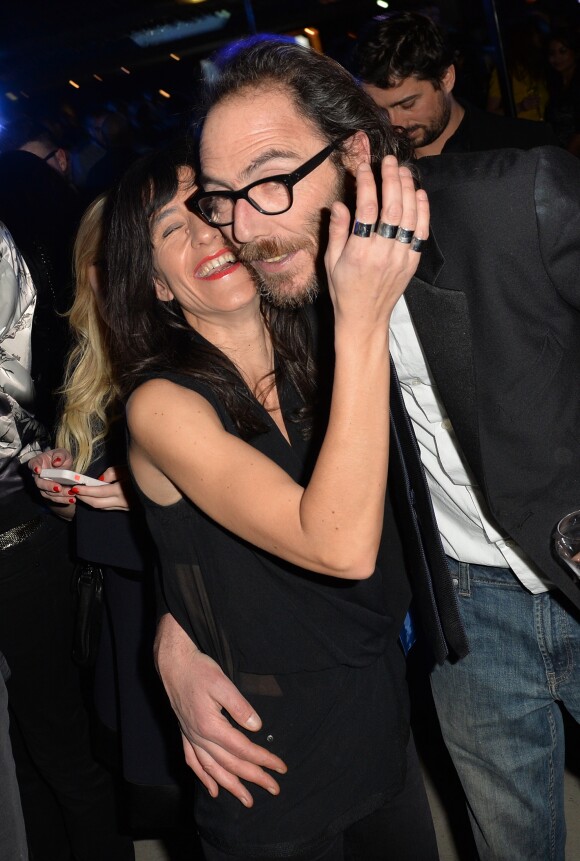 Romane Bohringer et son compagnon Philippe Rebbot - Cocktail lors de la présentation de la nouvelle étoile de la galaxie "Angel" de Thierry Mugler avec sa nouvelle égérie Georgia May Jagger à la Coupole du Printemps Haussmann à Paris, le 30 janvier 2015.